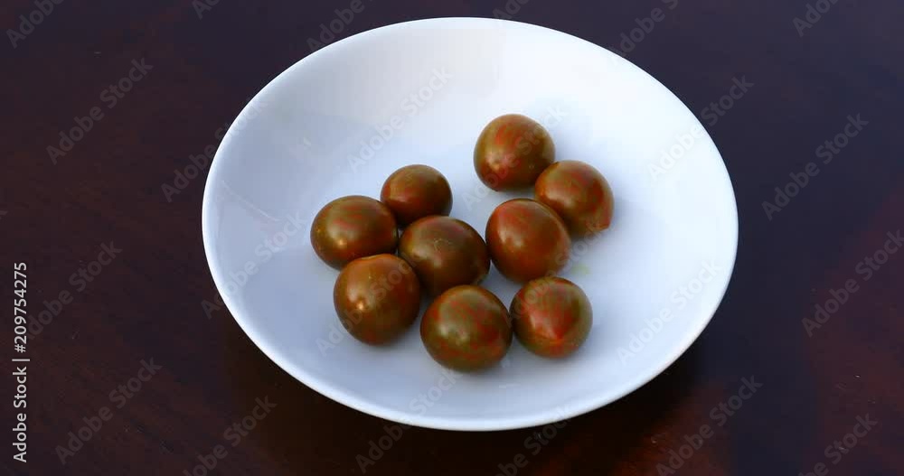 This is a bowl of Chocolate Sprinkle Tomatoes. This is a bowl of Chocolate Sprinkle Tomatoes.