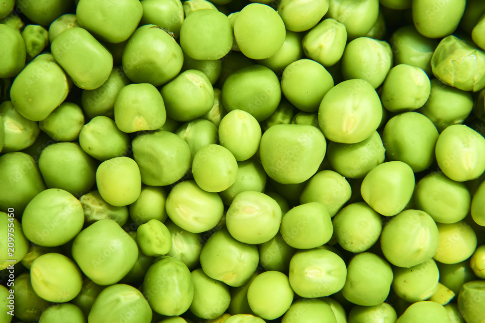 Fresh green peas background texture top view
Fresh green peas background texture top view
