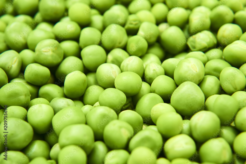 Fresh green peas background texture top view
Fresh green peas background texture top view