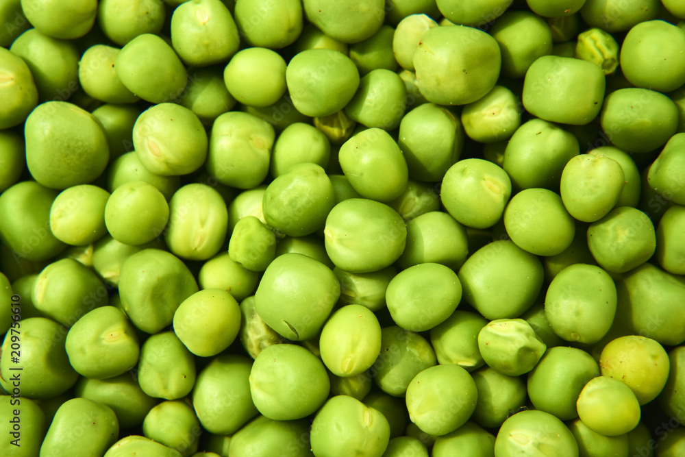Fresh green peas background texture top view
Fresh green peas background texture top view