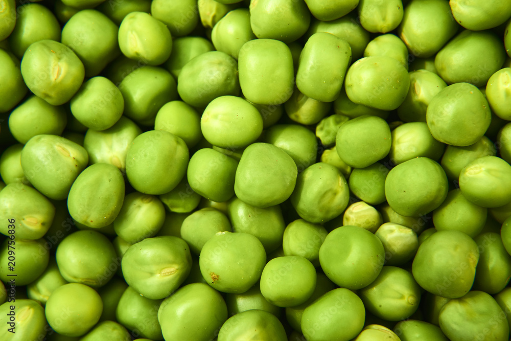 Fresh green peas background texture top view
Fresh green peas background texture top view