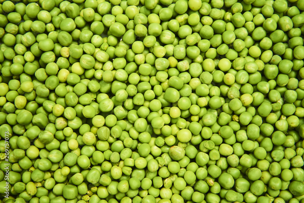 Fresh green peas background texture top view
Fresh green peas background texture top view