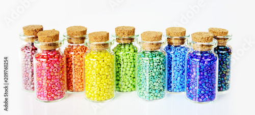 Fotografie, Obraz Multicolored beads on a white background