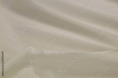 Lining fabric made of acetate and elastan in the color of ivory photo