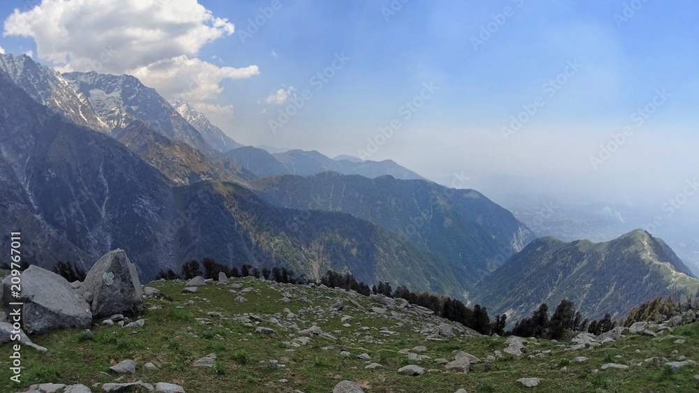 green mountain valley with snowy peaks