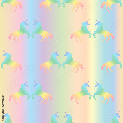  Vector illustration of seamless pattern from rainbow unicorns on pastel gradient background. Unicorn texture © olhabocharova