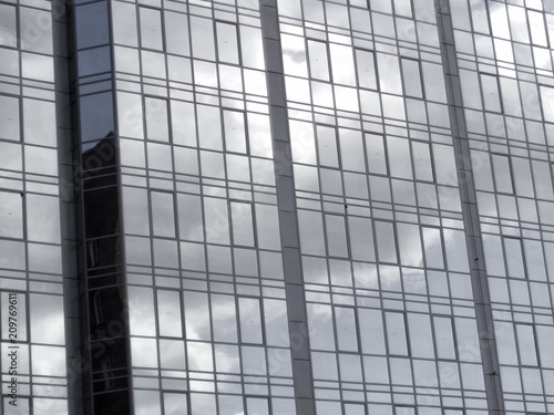 Modern building closeup. Windows. Glass wall. Modern architecture