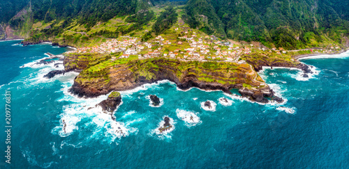 Aerial view - land meets ocean in Seixal, Madeira, Portugal
