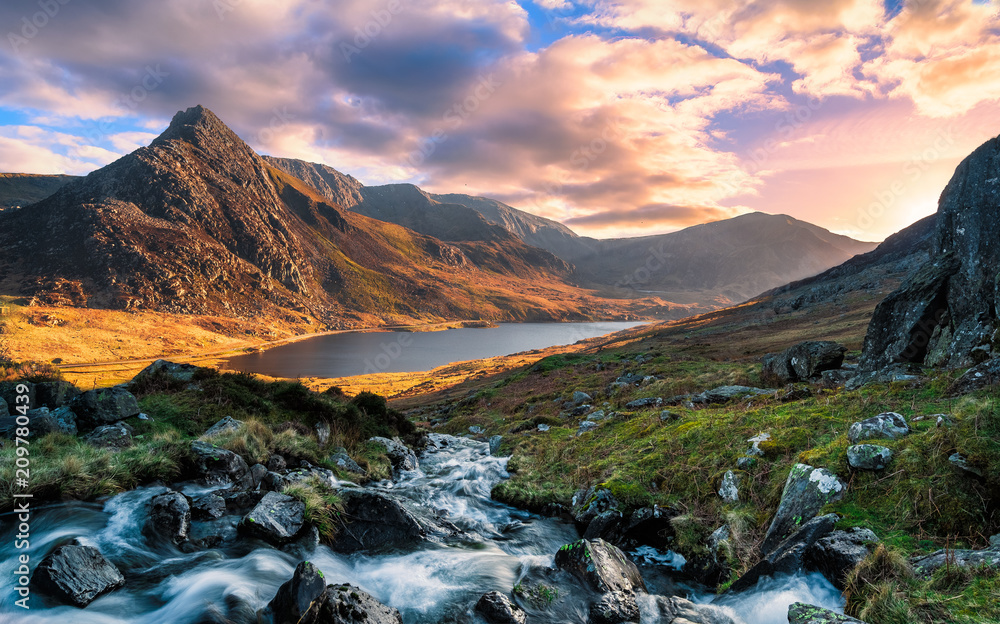 A rushing river flowing through the mountains of wales - obrazy, fototapety, plakaty 