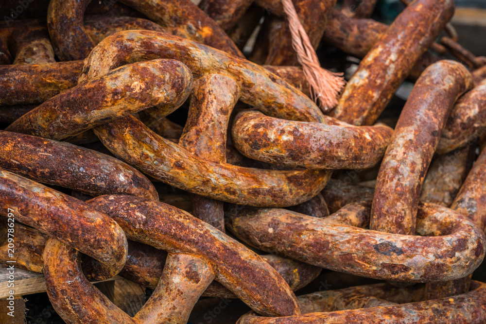 Pile of old heavy rusty chain links Pile of old heavy rusty chain links