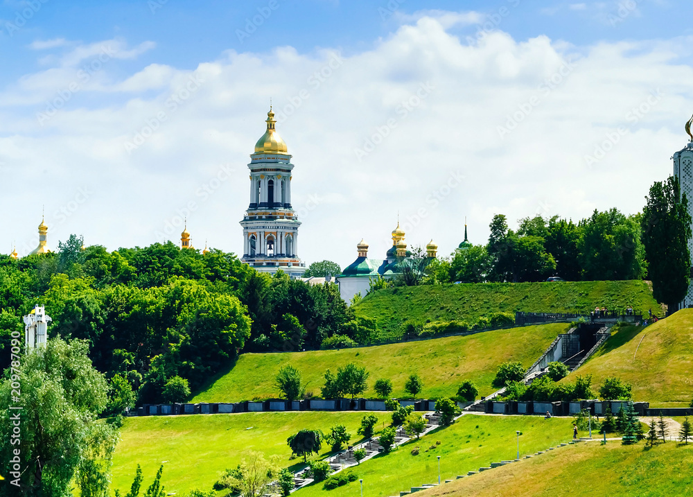 Panorama of the Kiev-Pechersk Lavra against the background of the city park, concept of travel and recreation, Ukraine, Kiev, copy space, closeup