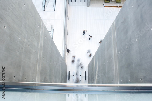 Birds Eye view of people moving in lobby