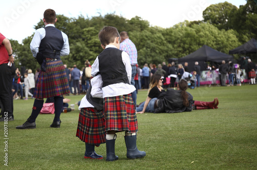 Two boys in kilts at the festival photo
