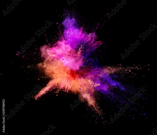 Explosion of coloured powder isolated on white background © Jag_cz