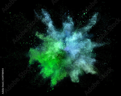 Explosion of coloured powder isolated on white background