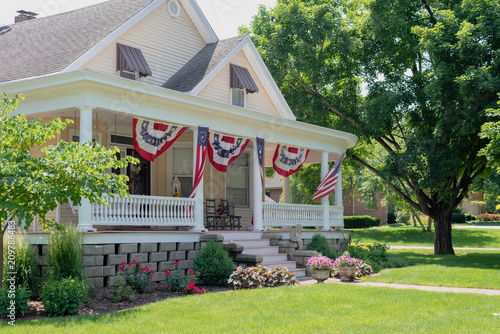 Charming home decorated with American flags for the Fourth of July