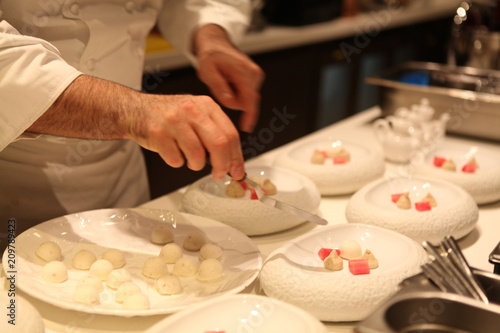 Professional Michelin Starred Chef Is Plating Luxury Fine Dining Dessert In White Stylish Bowl Beautiful And Modern Concept Style For Food Styling Creative Plating And Decorating Presentation Idea Stock Photo Adobe