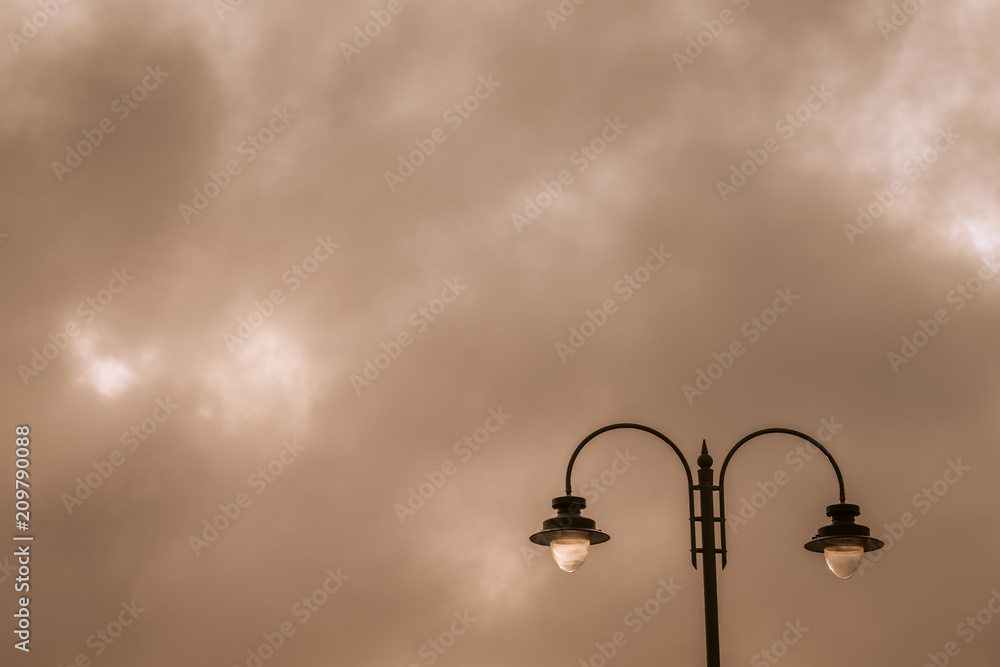 Picture of a street lamp during sunset Picture of a street lamp during sunset