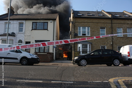 Building Burning behind police tape