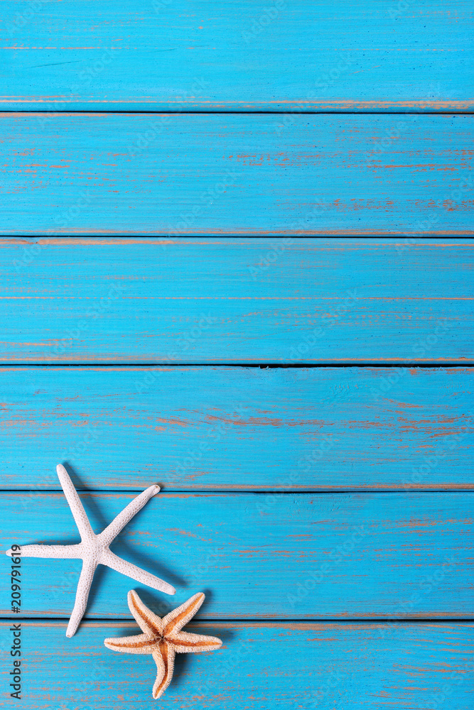 Starfish old weathered blue beach wood deck background vertical Starfish old weathered blue beach wood deck background vertical