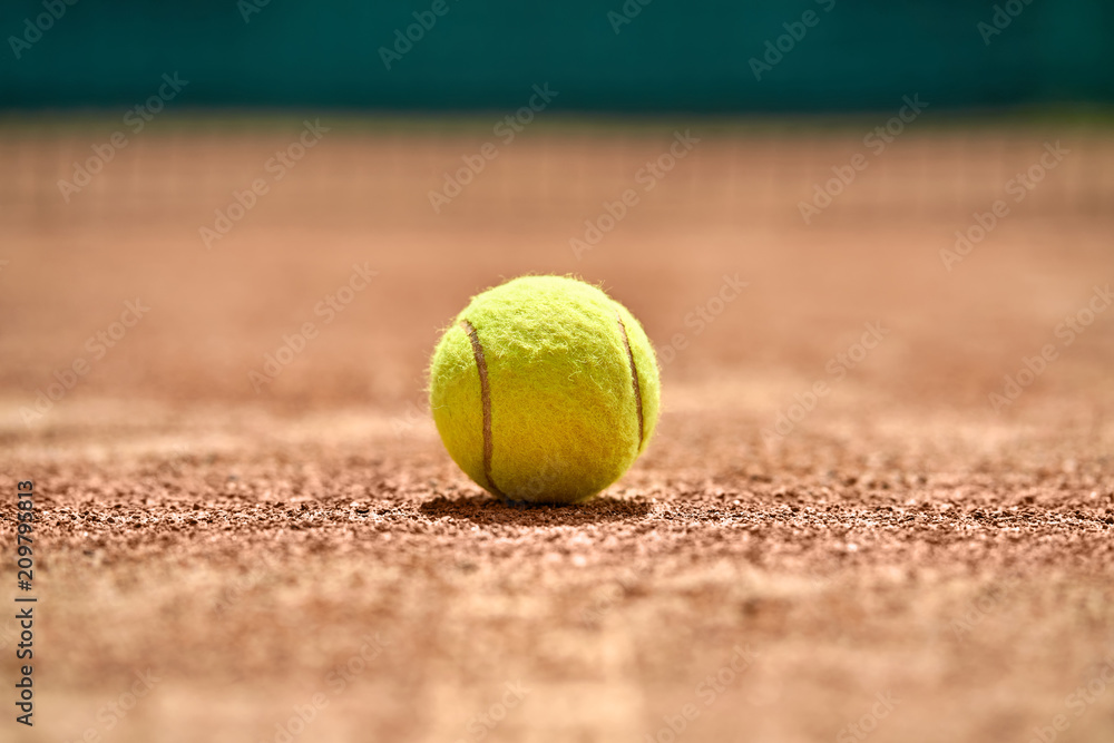Tennis ball on ground