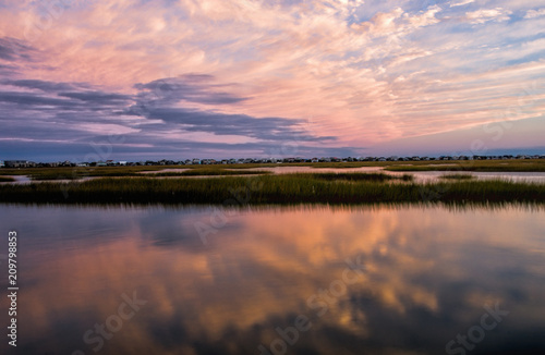 Sunset Colored Clouds with Reflection in Water © Laura Ballard