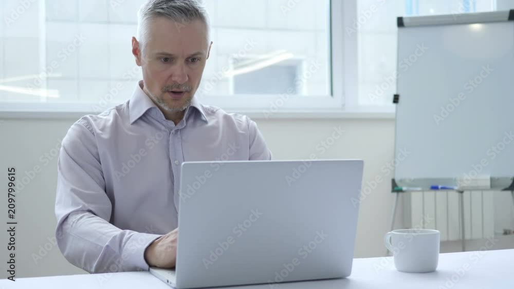 Shocked Businessman Working on Laptop, Astonished Shocked Businessman Working on Laptop, Astonished