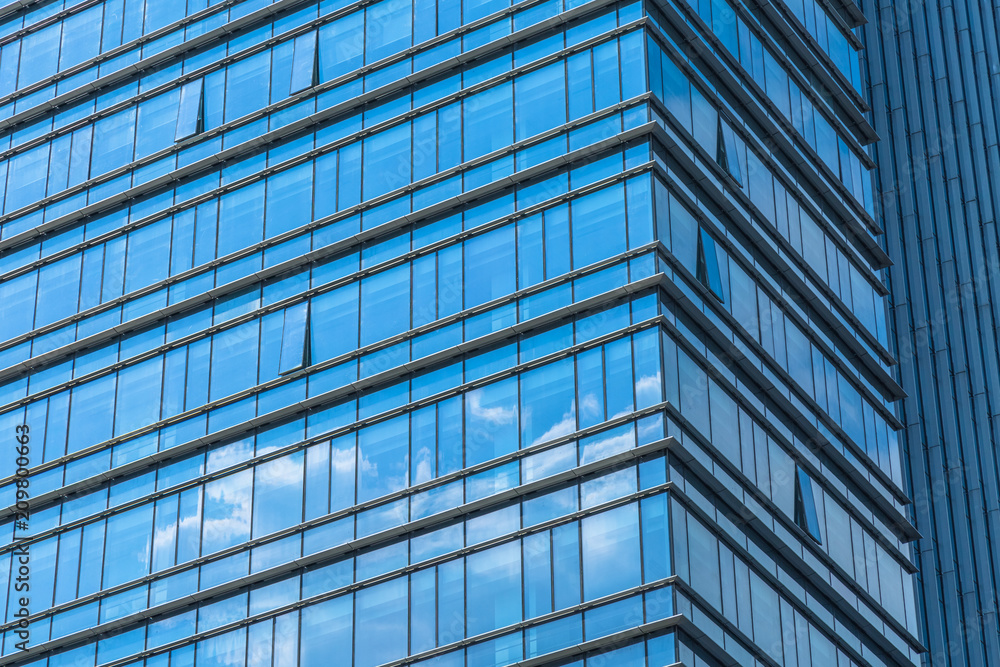 Urban abstract - windowed corner of office building.