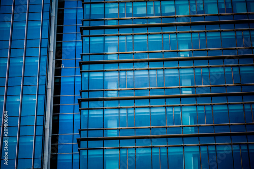 Urban abstract - windowed corner of office building.