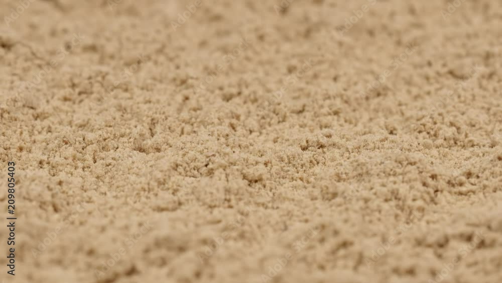 MACRO: Splash of ginger powder - Slow motion MACRO: Splash of ginger powder - Slow motion
