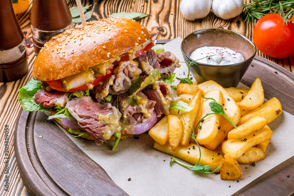 Burger with pastrami and fries Stock Photo Adobe Stock
