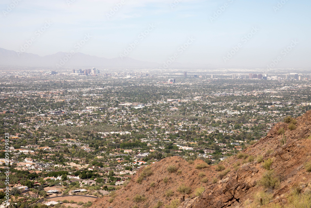 Fototapeta premium Phoenix skyline as viewed from Camelback mountain in Scottsdale, Arizona