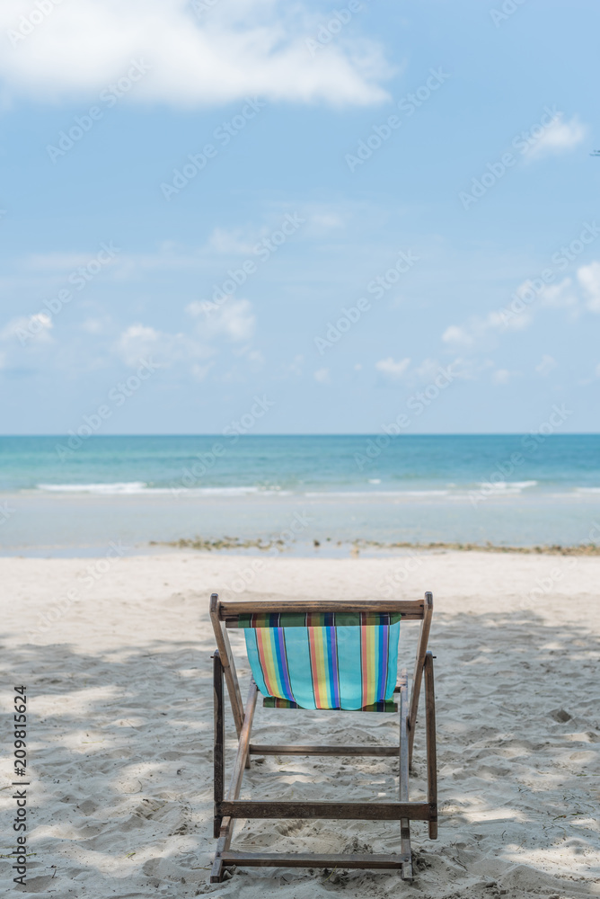 Blue sea and white sand beach with beach chairs summer beach no people