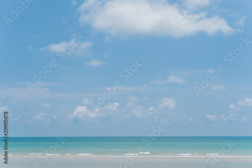 Beach with white sand and blue skies