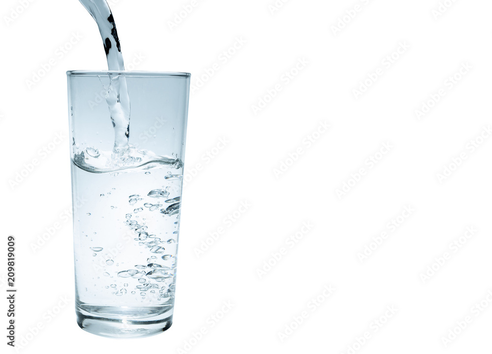 water to drink poured into a glass on a white background,clipping path included water to drink poured into a glass on a white background,clipping path included