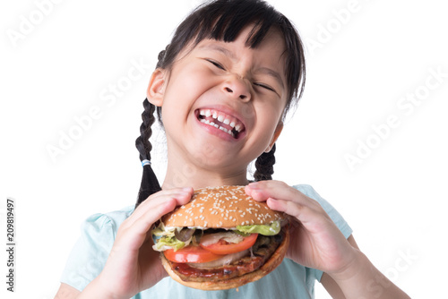 portrait of a beautiful girl  teenager and schoolgirl  holding a hamburger on a white background