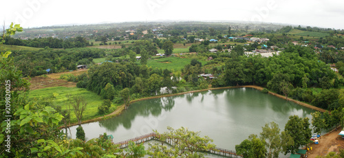 landscape of green field and lake