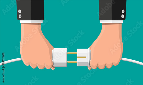 Businessmen hold plug and outlet in hand.