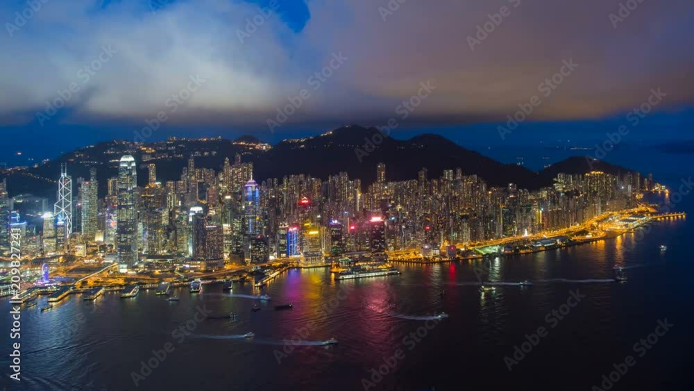 Elevated view across the busy Hong Kong harbour, Central district of Hong Kong Island and Victoria Peak, Hong Kong, China