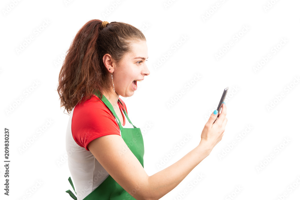 Female supermarket employee or storekeeper making video call. Female supermarket employee or storekeeper making video call.