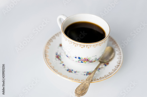 кофе с ложечкой в чашке