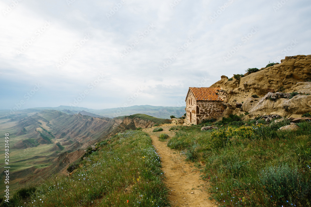 Ancient cave monastery of David Gareji carved into the rocks on the border of Georgia and Azerbaijan.