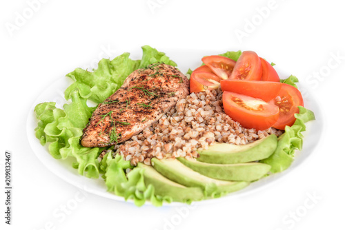 Wallpaper Mural Grilled chicken breast with buckwheat porridge, tomatoes and avocado isolated on white background. Torontodigital.ca