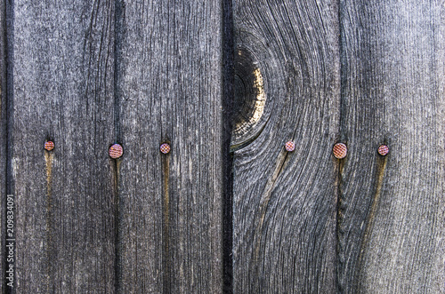 Background old planks with knots and cracks