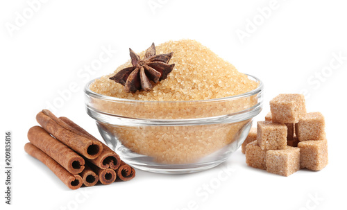  a bowl of cane sugar and cinnamon on a white background