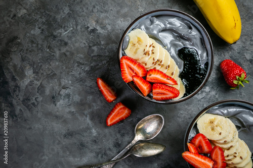 Detox activated charcoal strawberry and banana yogurt bowl