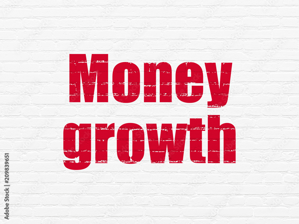 Currency concept: Painted red text Money Growth on White Brick wall background