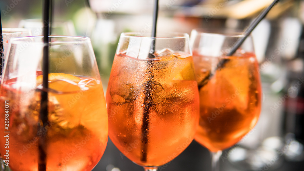 .summer citrus cold alcohol drink Aperol Spritz close-up - obrazy, fototapety, plakaty 