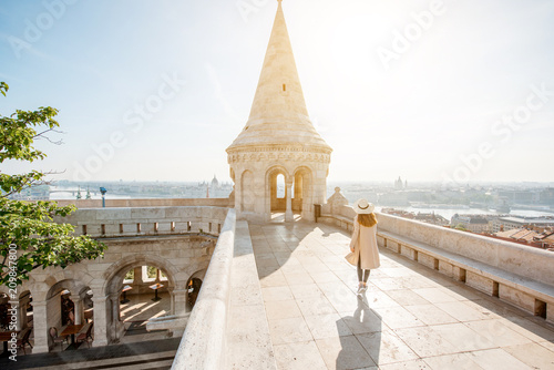Canvas Print Young woman tourist on the terrace with great cityscape view traveling in Budape