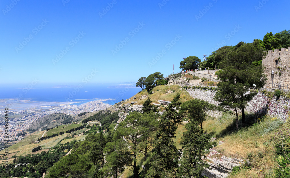 Erice in Sicily, view from observation deck near Castello di Venere towards sea and city of Trapani. Island of Favignana is visible on horizon Erice in Sicily, view from observation deck near Castello di Venere towards sea and city of Trapani. Island of Favignana is visible on horizon